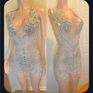 This beautiful sequin maxi mini dress is cute for any special occasion.